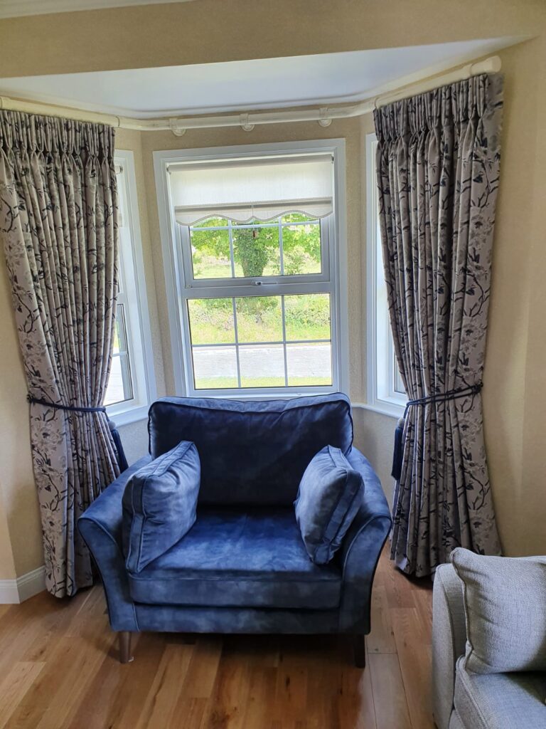 Curtains and blue chair